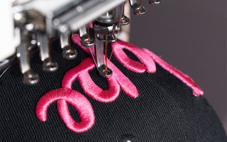 How can embroidery threads of different materials and specifications be paired with different types of needles?
